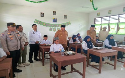Bupati Bolsel Resmi Salurkan MBG Hari Pertama di Kecamatan Helumo (MTs Negeri 2 Bolsel)